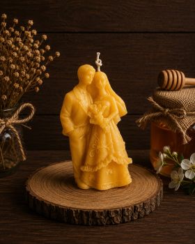 Introducing our Newlywed Couple Beeswax Candle, a beautiful and meaningful gift to celebrate love and union. Crafted from our finest beeswax, this candle embodies the warmth and purity of marriage.
Standing tall at 140mm in height and 90mm in width, our Newlywed Couple Beeswax Candle symbolizes the strength and unity of the bond between two souls. With a weight of 186g, it offers a substantial presence, perfect for commemorating this special occasion.
Enjoy up to 30 hours of burn time as the soft glow of this elegant candle fills the newlyweds' home with love and harmony. Whether adorning their living space or serving as a centerpiece during romantic dinners, our Newlywed Couple Beeswax Candle is a heartfelt reminder of the lifelong journey they have embarked upon together.