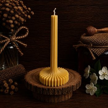 Introducing our Creative Vases Beeswax Candle, a unique blend of craftsmanship and natural beauty. Handcrafted with care from our own beeswax, each candle is a testament to the artistry and purity of nature.
Standing at 200mm in height and 100mm in width, our Creative Vases Beeswax Candle is not just a source of light but a stunning decorative piece for any space. Weighing 231g, it boasts a substantial presence that commands attention.
Enjoy the gentle glow and subtle fragrance of pure beeswax as it burns for approximately 35 hours, filling your home with warmth and ambiance. Whether adorning your living room, dining table, or bedroom, this candle adds a touch of natural elegance to any setting.