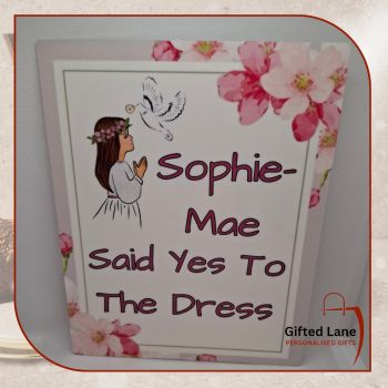 Did you just say yes to your First Communion Dress. These personalised First Communion Yes to the Dress Signs are a fun and a unique personalised gift to show everyone that you have said yes to your Communion Dress. They can be personalised with any picture or text and with a date or name on them.&nbsp; Another special personalised gift from Gifted Lane&nbsp;