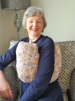 This breast cancer surgery support pillow is ideal for use directly after surgery, or in the following weeks while healing takes place. * This support pillow is shaped to fit comfortably under the affected arm, and is filled with quality polyester filling to a firm finish, provide adequate support and comfort
I am a breast cancer survivor myself so I understand what is needed after having had chest surgery, and how important comfort and support is when you're healing.
It measures 43cm wide X 37cm long and 10 cm in depth. This peach and paisley cotton fabric is soft and breathable. All cushions come with a made with love by Rodgerson Handcraft label and are reversible.