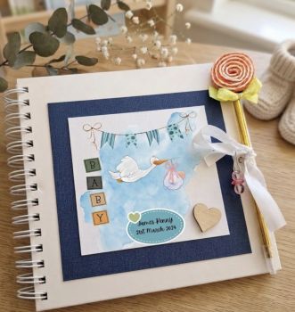 Celebrate the arrival of a little one with this beautiful personalised new baby and christening scrapbook photo album gift. Cherish precious memories and milestones with this unique keepsake. A perfect gift for new parents or for a christening ceremony. Order yours today!
Each book comes with a gorgeous pen ,a colourful pendant and some stickers to get you started just free of charge!
There are&nbsp; different designs to choose from , just pick you preferred one from the options available.
All albums can be gift wrapped , with a gift note if desired (Please just send me a message if you required it)
Please notice that some colours for the underneath textured paper, pen, pendant and some embellishments will vary depending of stock availability and matching items.
Each album is carefully made to order, so there may be some slight variation in the design depending of the length of text required
Product features: spiral bound,40 sheets,200 gsm white paper, acid free.
Album size: 8 x8 inches.
Matching products available. You can choose to add a matching personalised frame to your order for a discounted price. The completed set for that extra special touch!