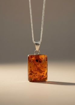 Amber helps to balance the emotions, clear the mind and release negative energy. Amber is a stone of protection, good luck and warmth. It aids manifestation, eases stress by clearing phobias and fears, and it is a lovely warm stone to wear. It is a powerful healer that gives the person who wears it a lovely sense of health and healing.