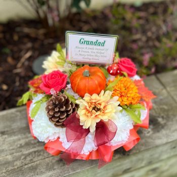 An autumn sympathy posy grave wreath suitable for a funeral or as a tribute for an Anniversary or Birthday memory