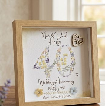 Printed wedding anniversary with wooden embellishments.