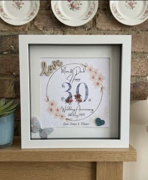 Printed wedding anniversary with wooden embellishments.